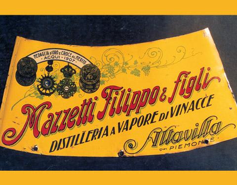 Etichetta dell'impresa di inizi Novecento dove si ricorda la medaglia d'oro e croce al merito ricevuta ad Acqui nel 1907